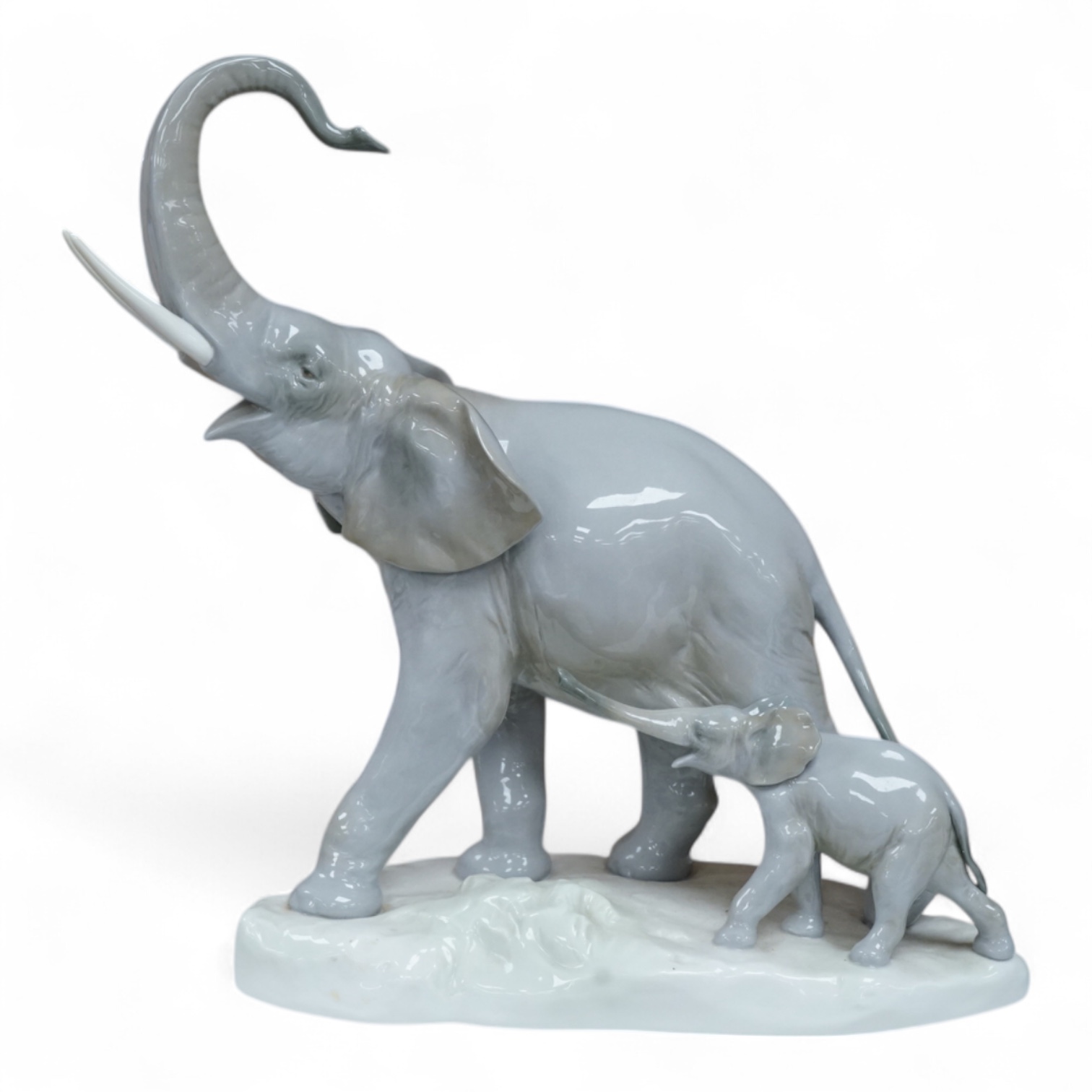 A Lladro elephant and calf figure group, 30cm high